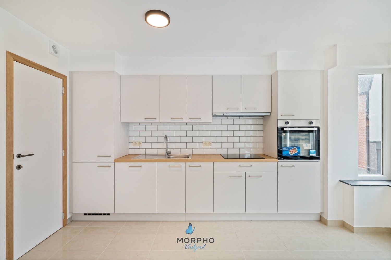 Modern en energiezuinig appartement met 2 slpks en vergezicht op de Schelde – hartje Temse! foto {{pictureIndex}}