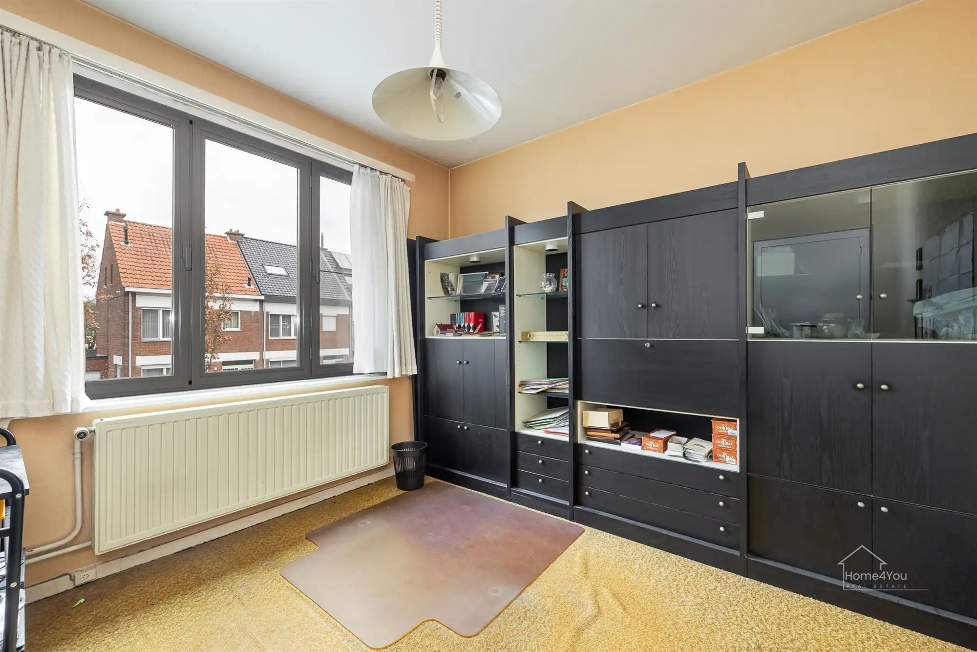 Ruime rijwoning op toplocatie met zongerichte tuin foto 16