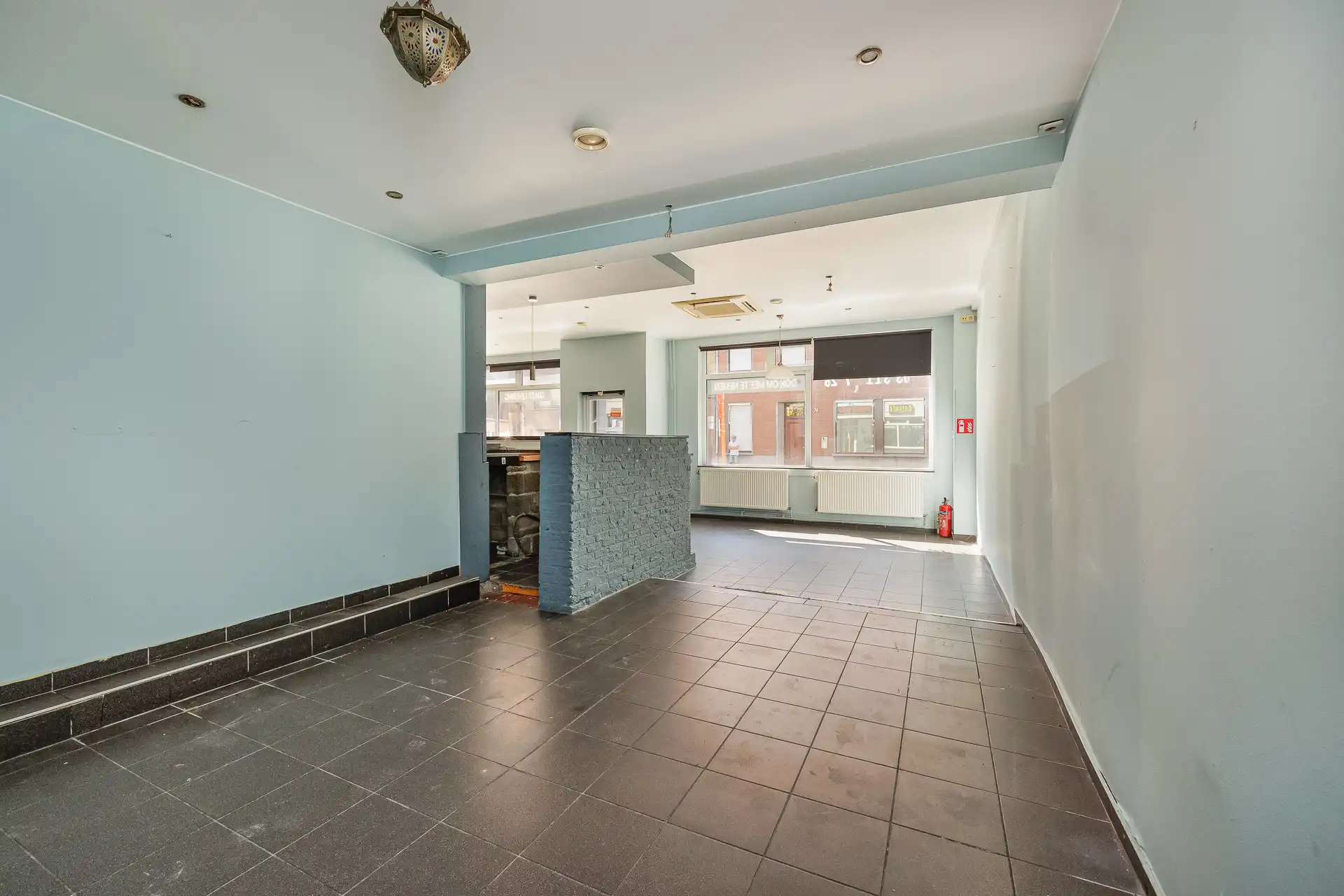 Te renoveren halfopen bebouwing: handel & appartement foto 8