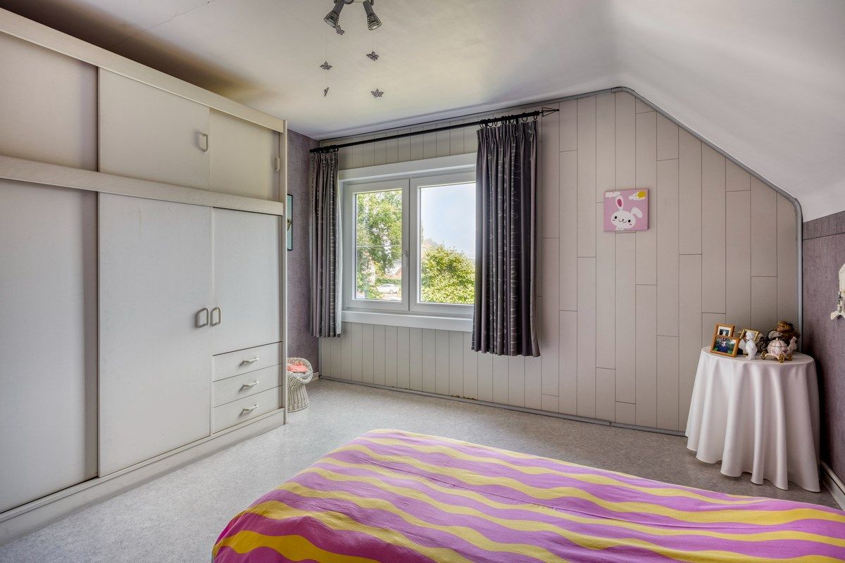 Rustig gelegen woning met oa 4 slpks op een mooi breed perceel van 21 are. foto 20