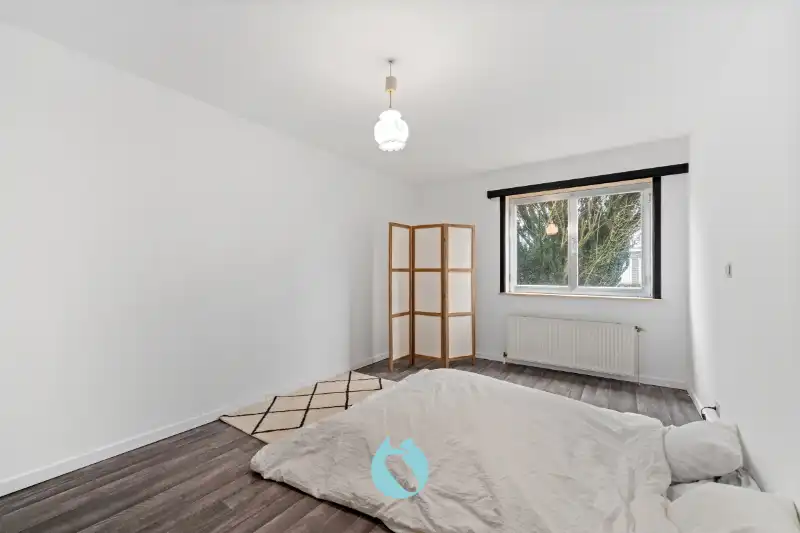 Kleinschalig gebouw met 2 appartementen en 2 garages foto 23