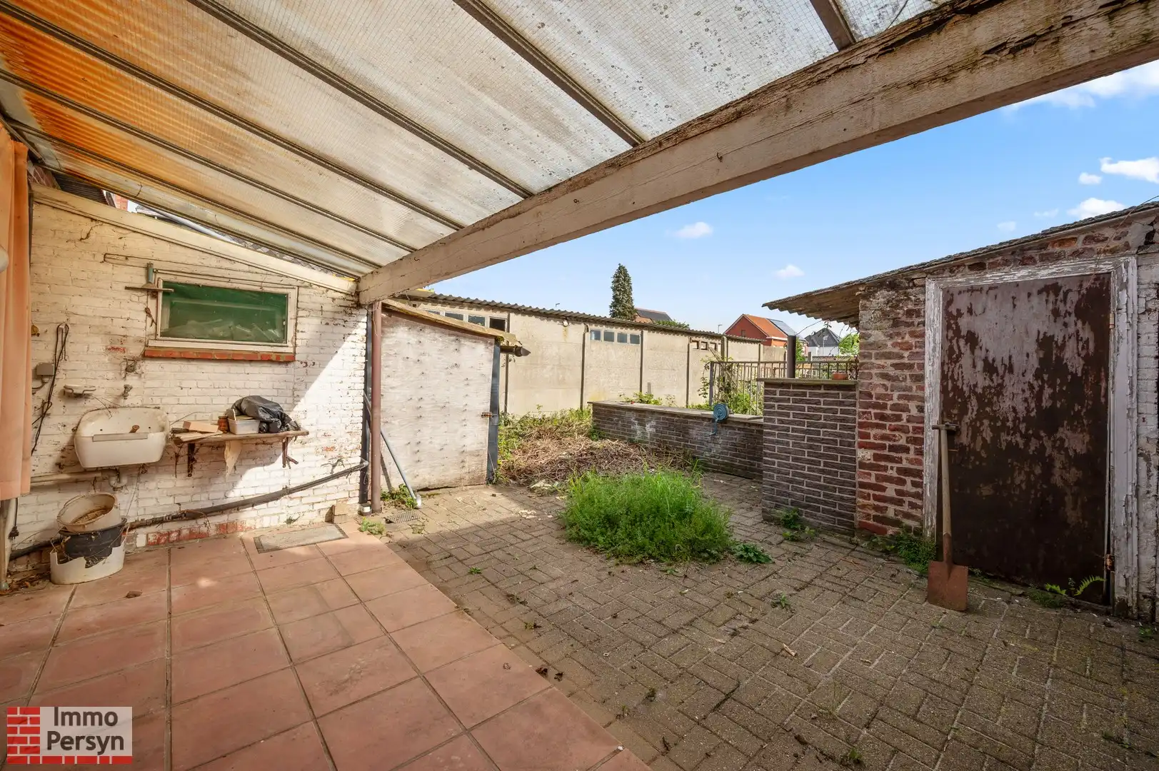 Te renoveren woning met zuidtuin en achteringang met garages foto 21