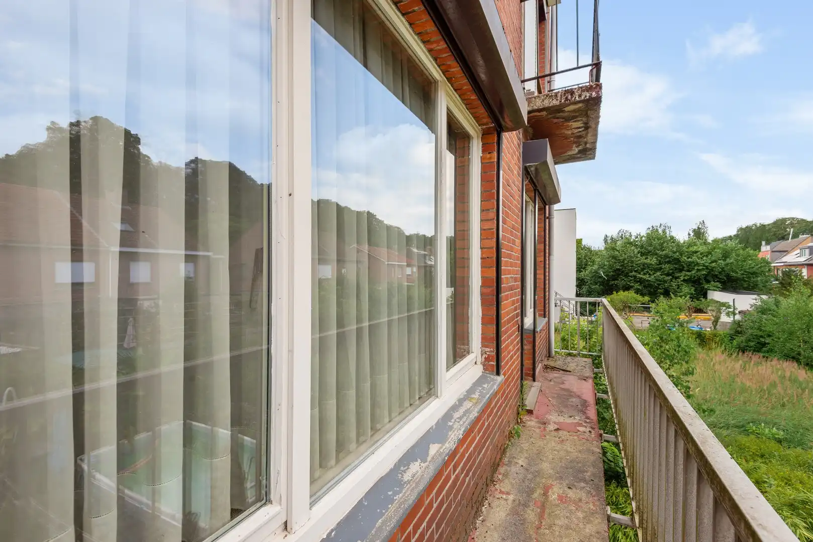 Op te frissen 2-slp appartement met autostaanplaats en tuin foto 12