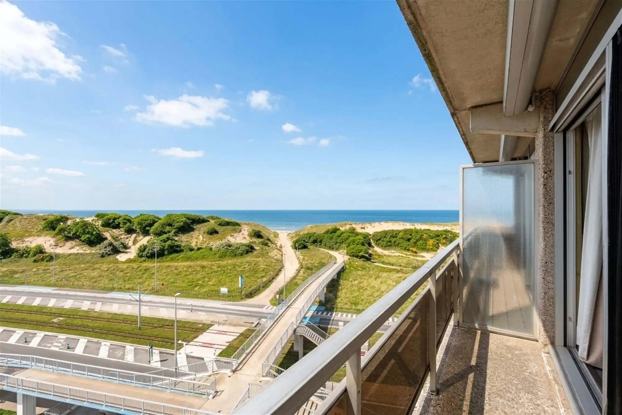 Instapklare studio met adembenemend uitzicht op zee en duinen! foto 3