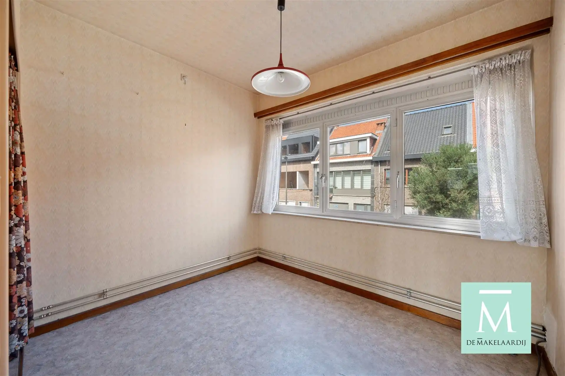 Ruime woning met 3 slaapkamers, aangename tuin en inpandige garage foto 11