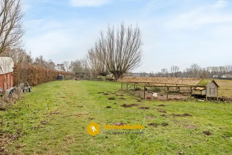 LANDELIJKE WONING MET ENORM RUIME TUIN TE KOOP IN WACHTEBEKE foto 31