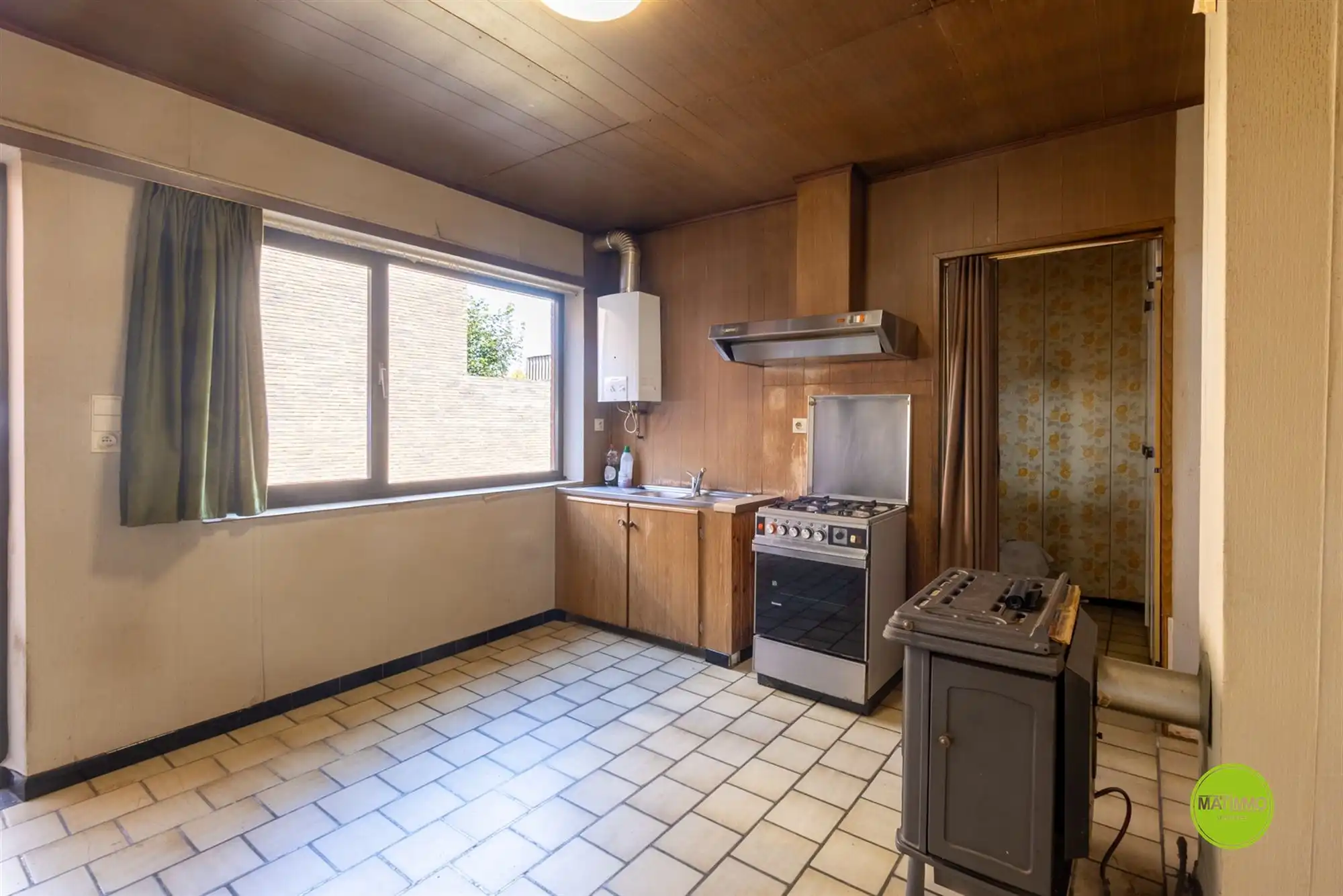 Compacte halfopen renovatiewoning met 2 slaapkamers en tuin foto 5