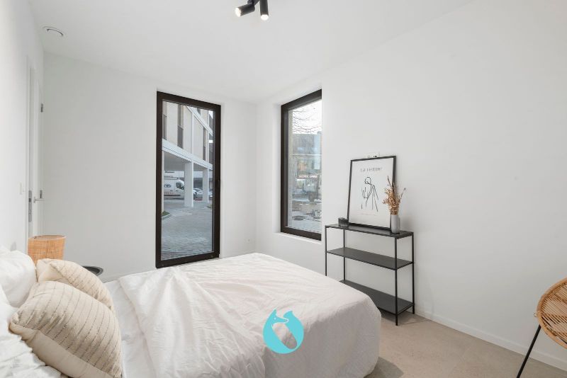 Green Square presenteert u 35 nieuwbouwappartementen en een winkelpand, letterlijk ónder de Kerktoren van Sleidinge. foto 5