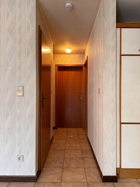Gelijkvloers appartement met 2 slpkms, autostaanplaats en private berging foto 7