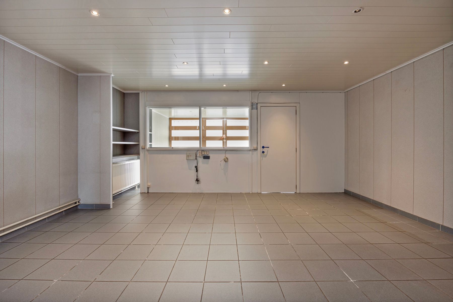 Handelshuis, ingedeeld als commerciële ruimte + appartement foto 4