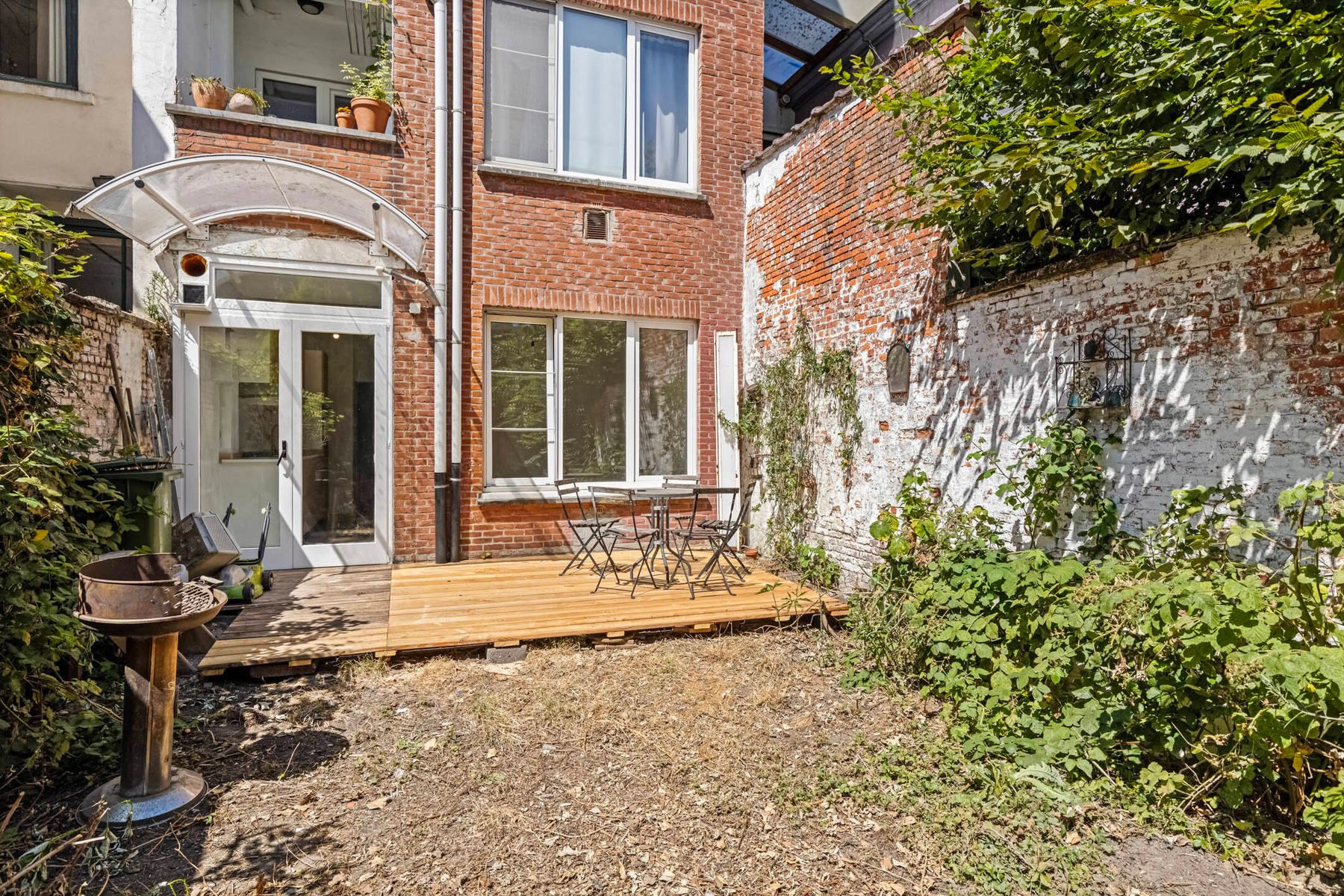Instapklaar 1-slaapkamerappartement met ruime tuin. foto 12