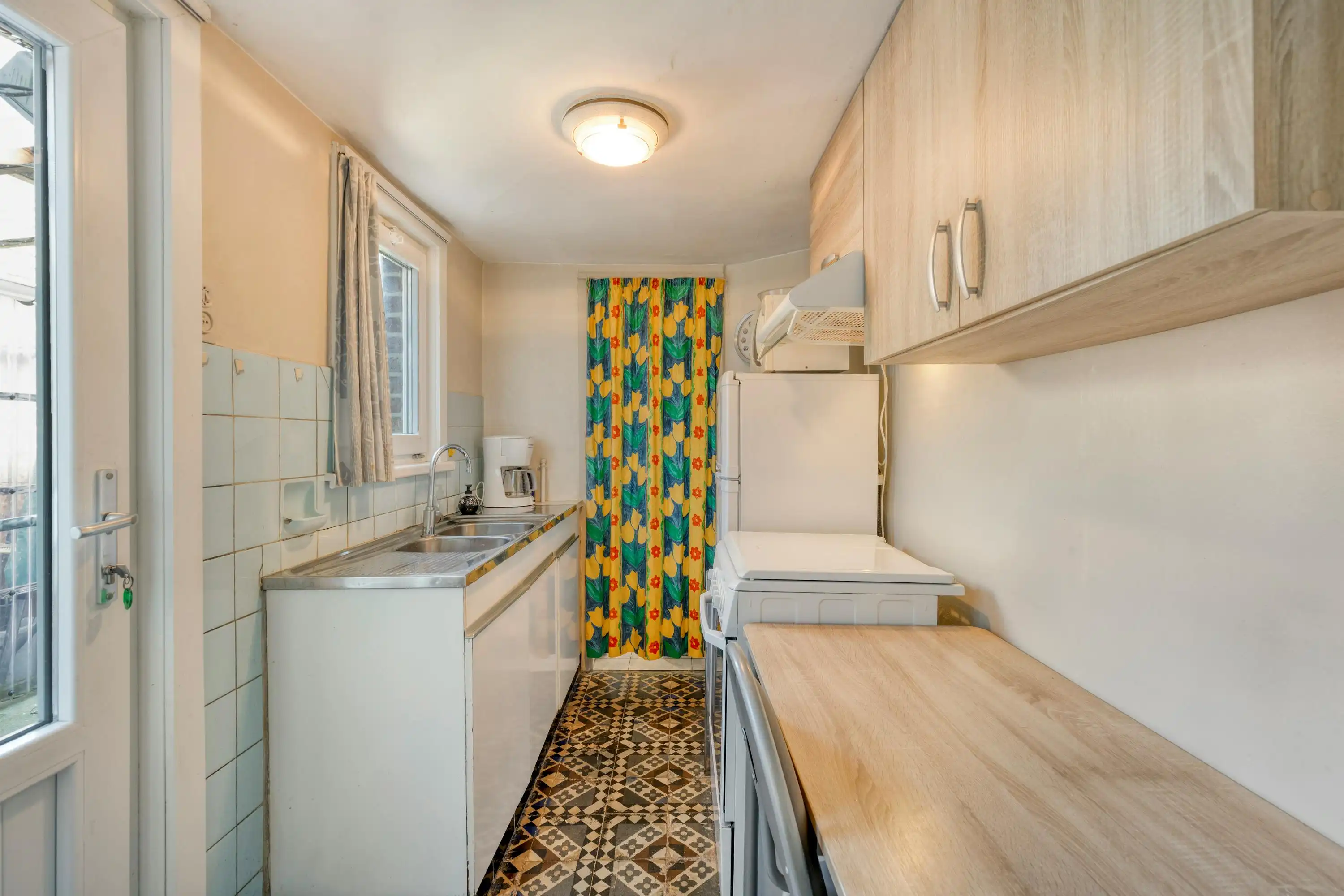 Te renoveren woning met leuke stadstuin in centrum Drongen foto 6