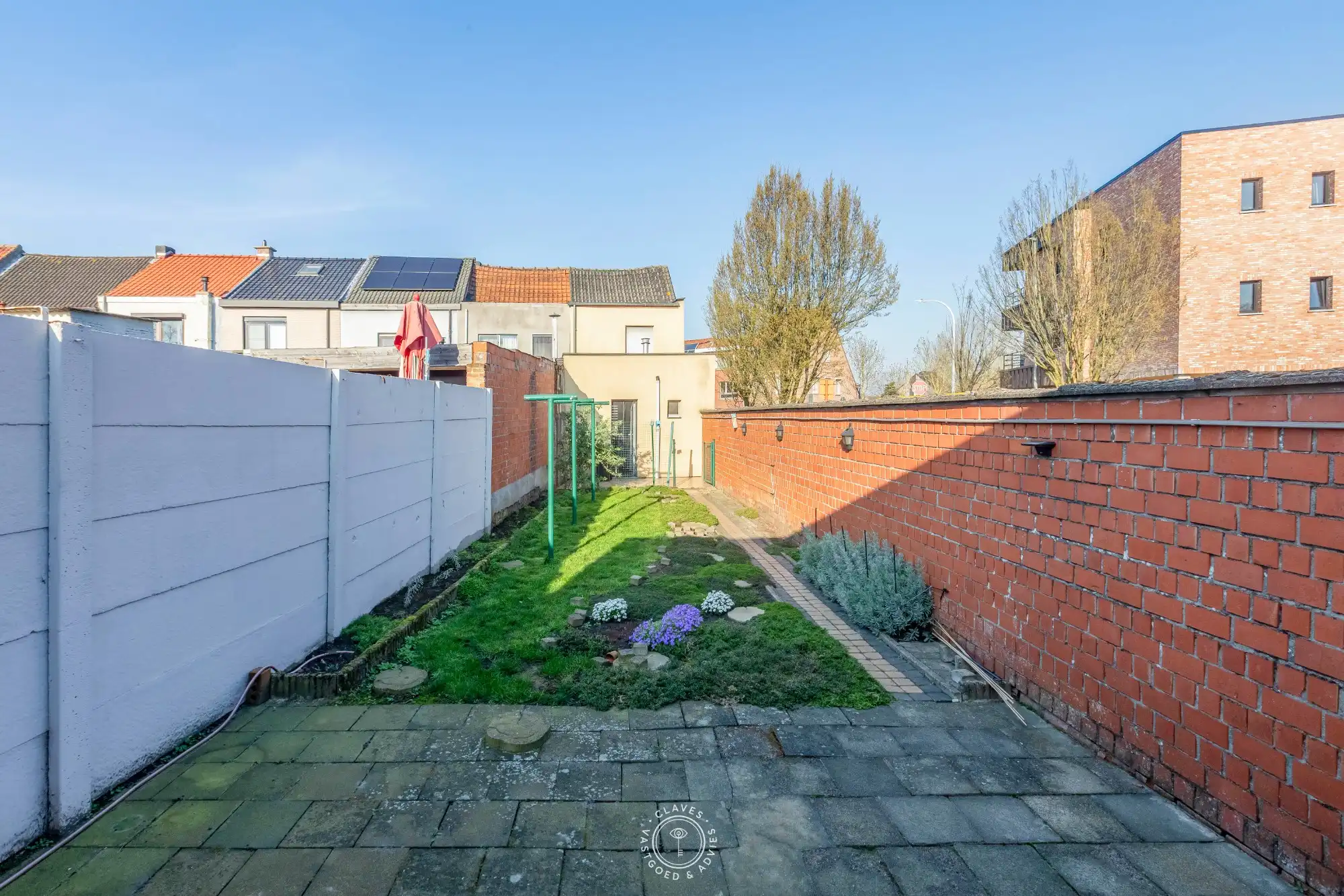 Fijne halfopen bebouwing met garage en tuin foto 3