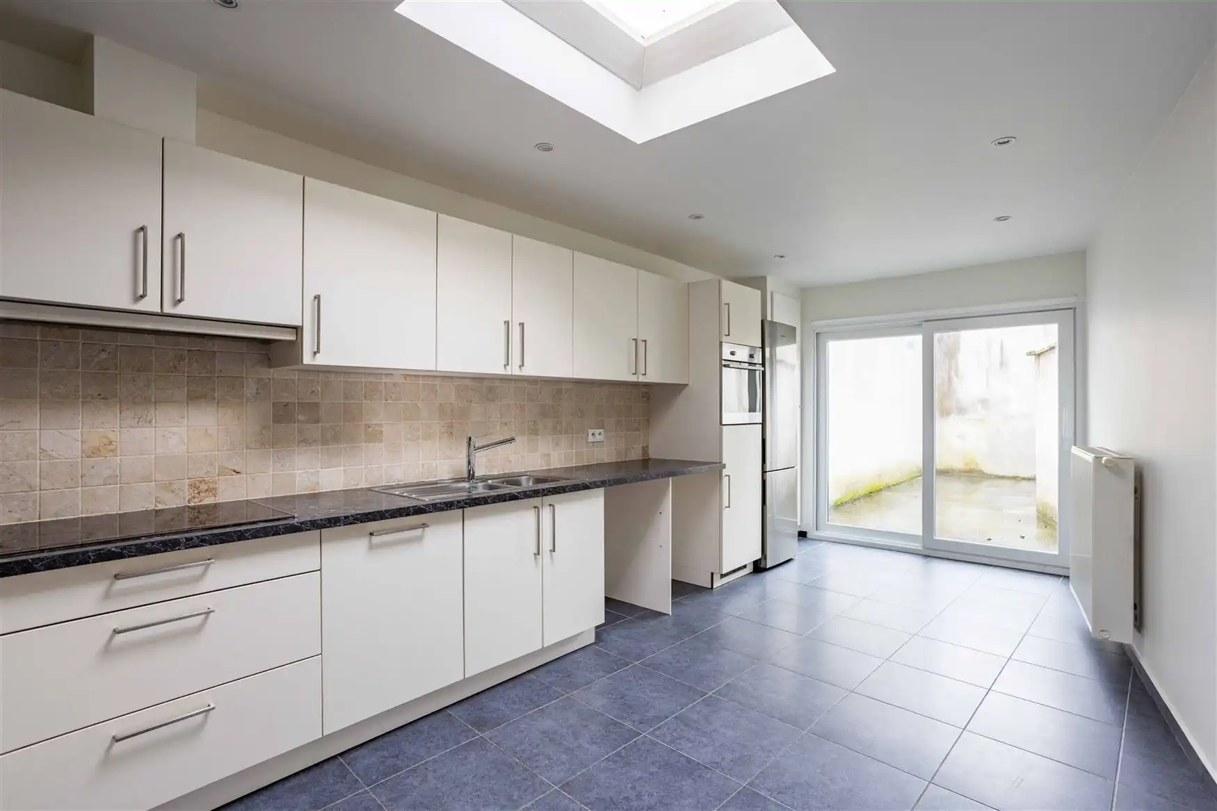 Instapklare woning met 4 kamers en koer in Gent foto 11