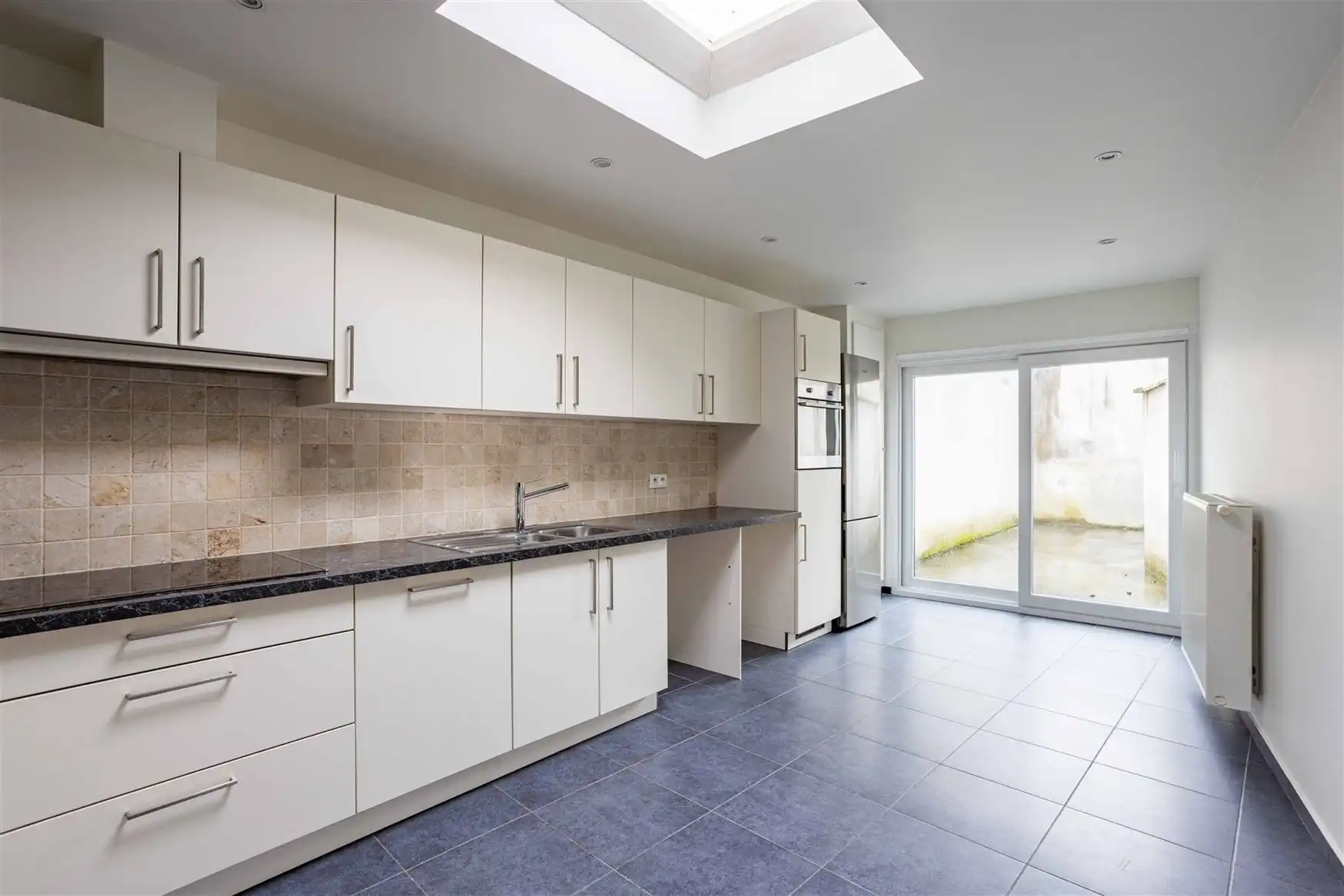 Instapklare woning met 4 kamers en koer in Gent foto 11