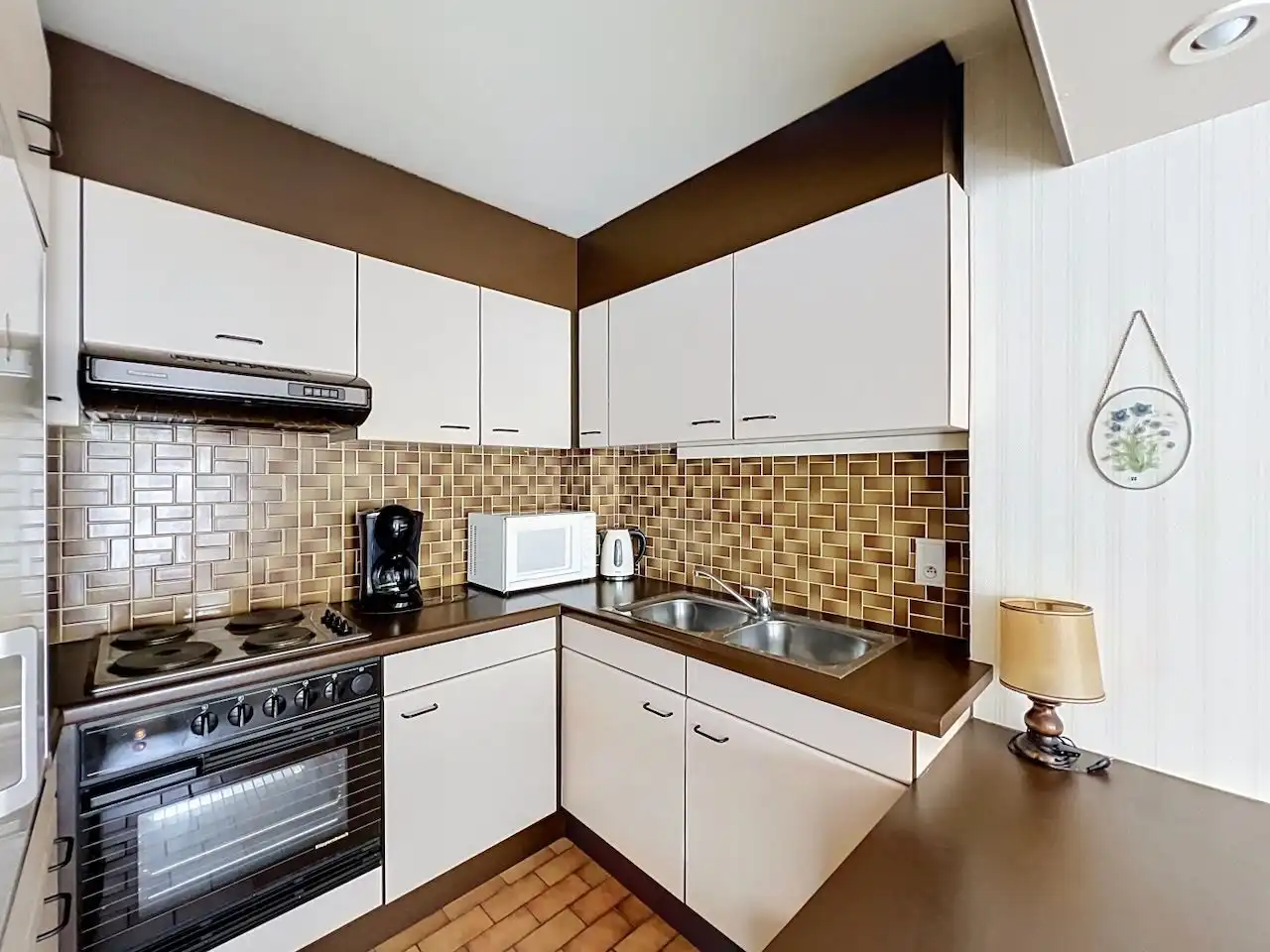 Perfect onderhouden appartement met zuidgericht terras in de O.L.Vrouwstraat ter hoogte van het Heldenplein foto 6