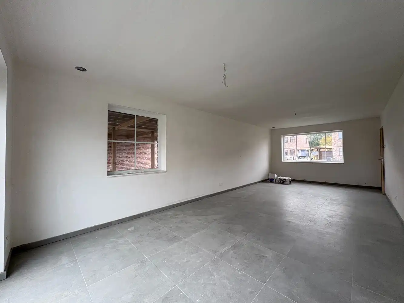 Nieuwbouwwoning met drie slaapkamers + carport foto 4