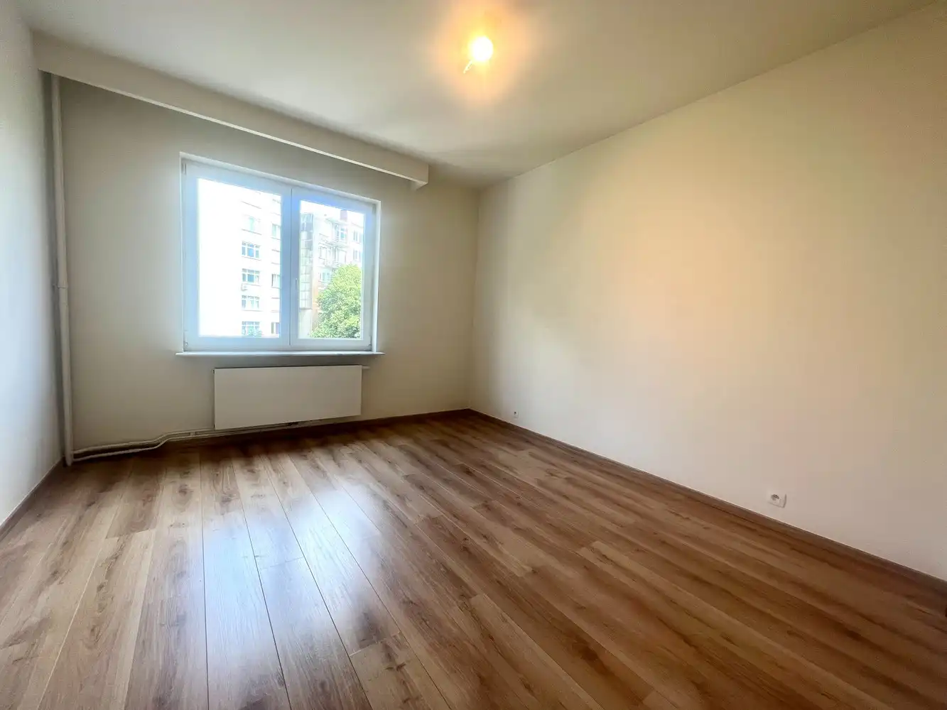 Gerenoveerd en ruim 2-slpk appartement te huur nabij het Stadspark! foto 14
