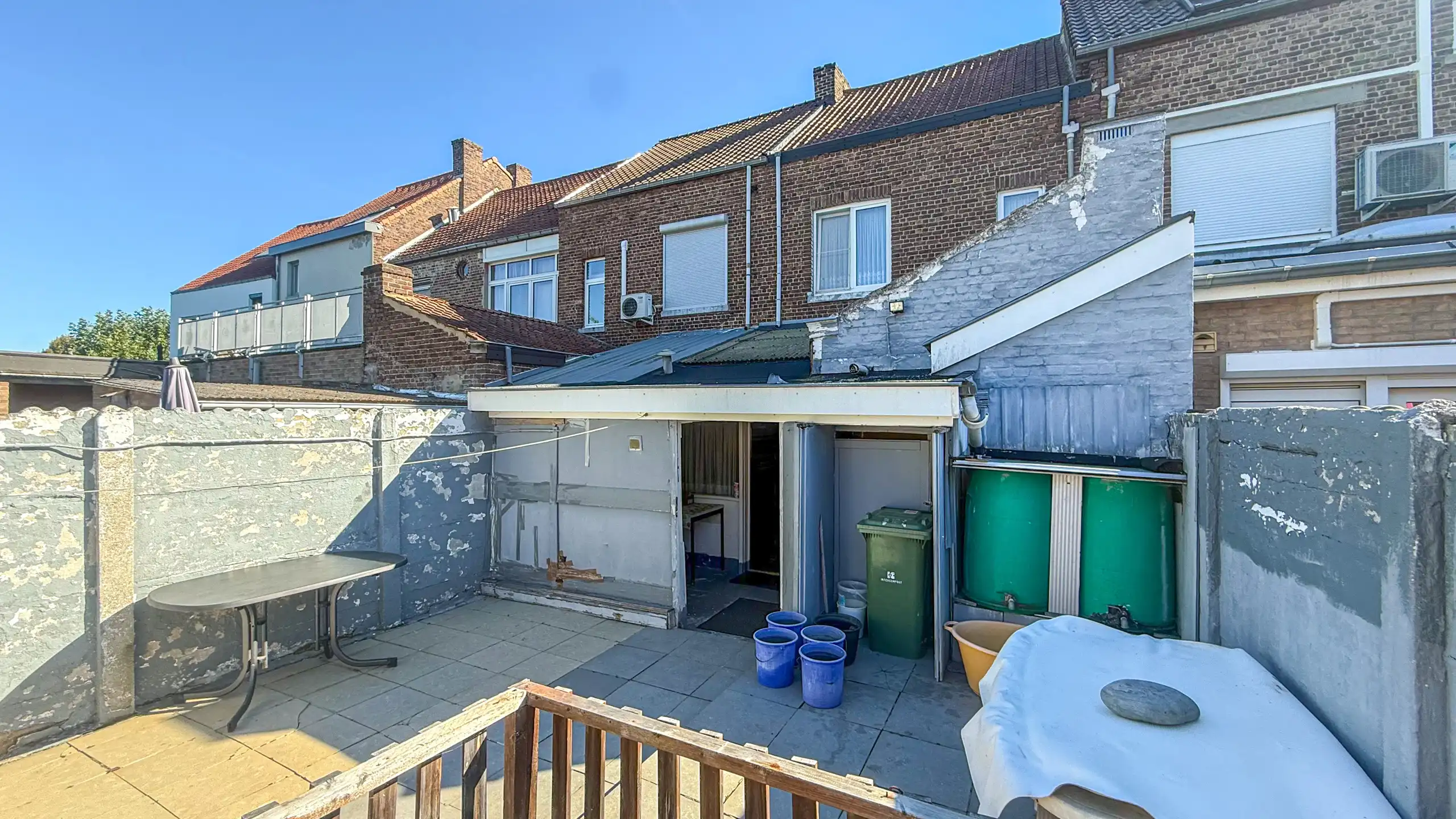 Op te frissen rijhuis met 3slpk + tuin in Sint-Truiden! foto 35