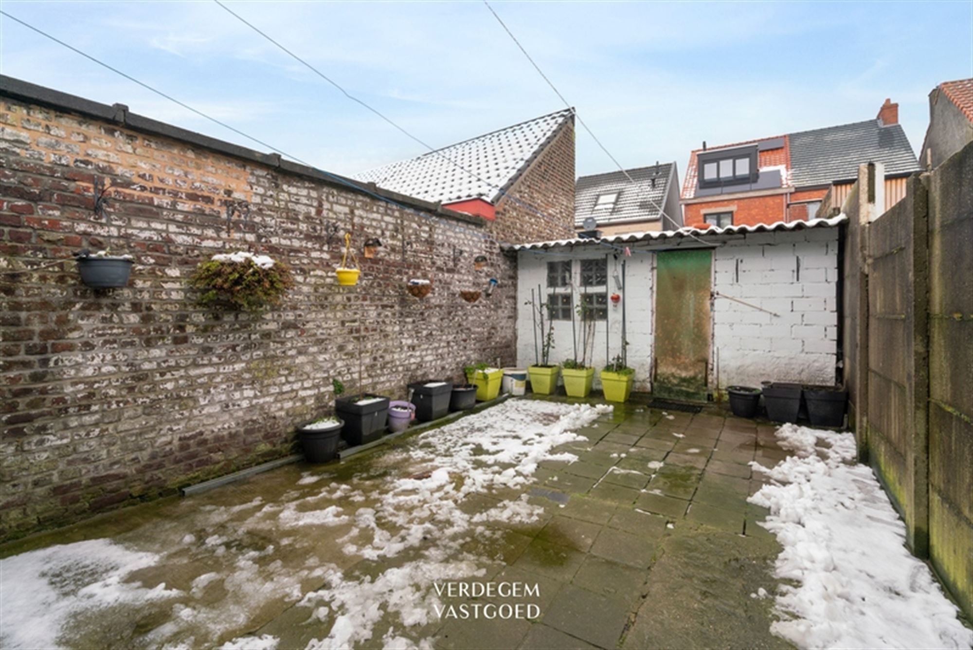 Centraal gelegen rijwoning met 4 slaapkamers en stadstuintje foto 16