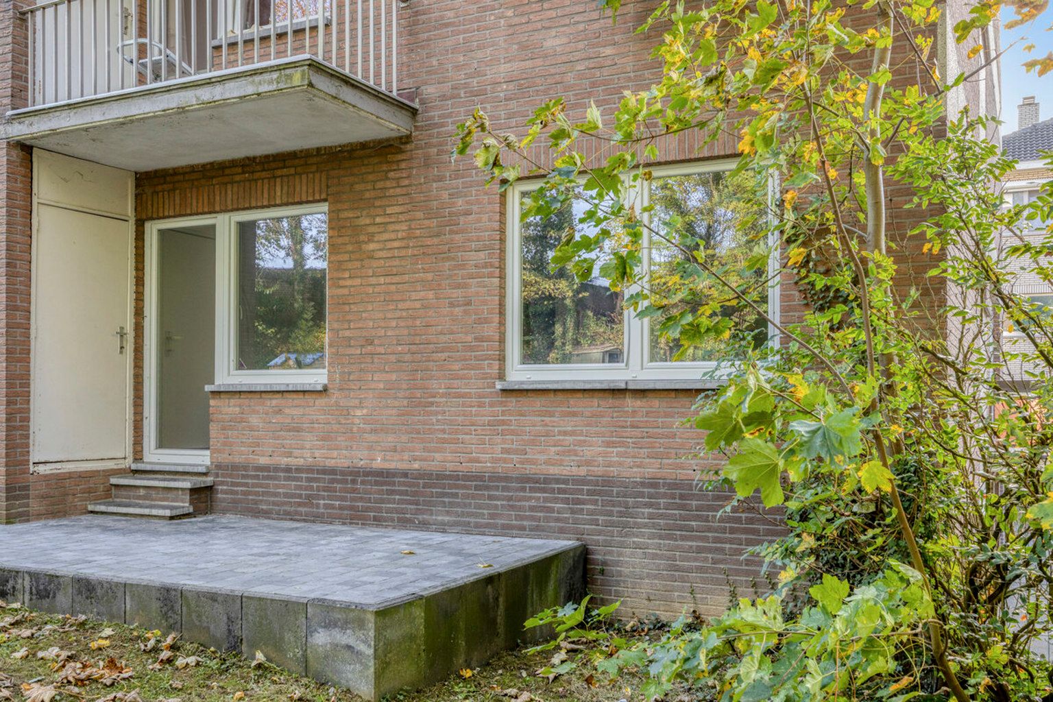 Instapklaar gelijkvloers appartement met eigen tuin foto 22