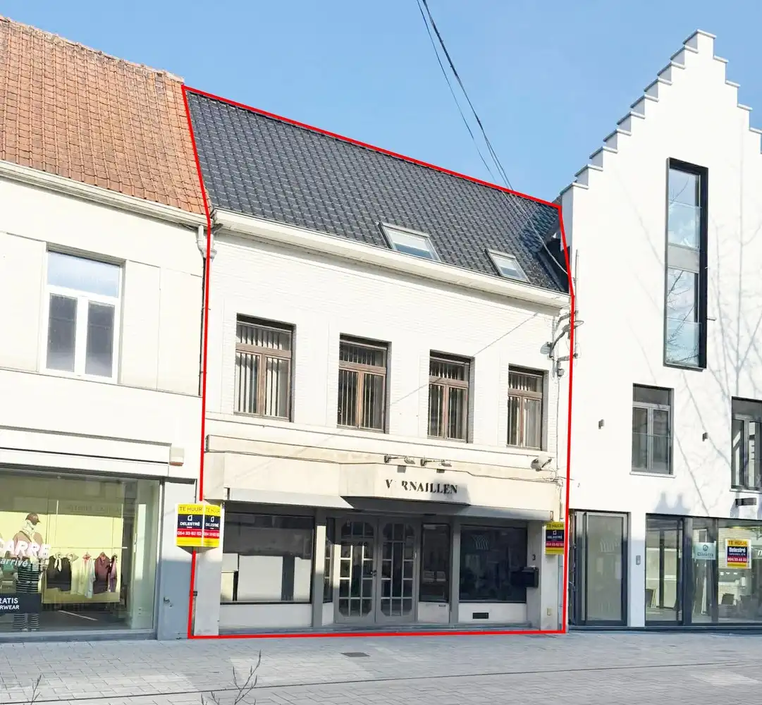 Handelsgebouw met verdiep te huur op topligging in centrum Ninove foto {{pictureIndex}}