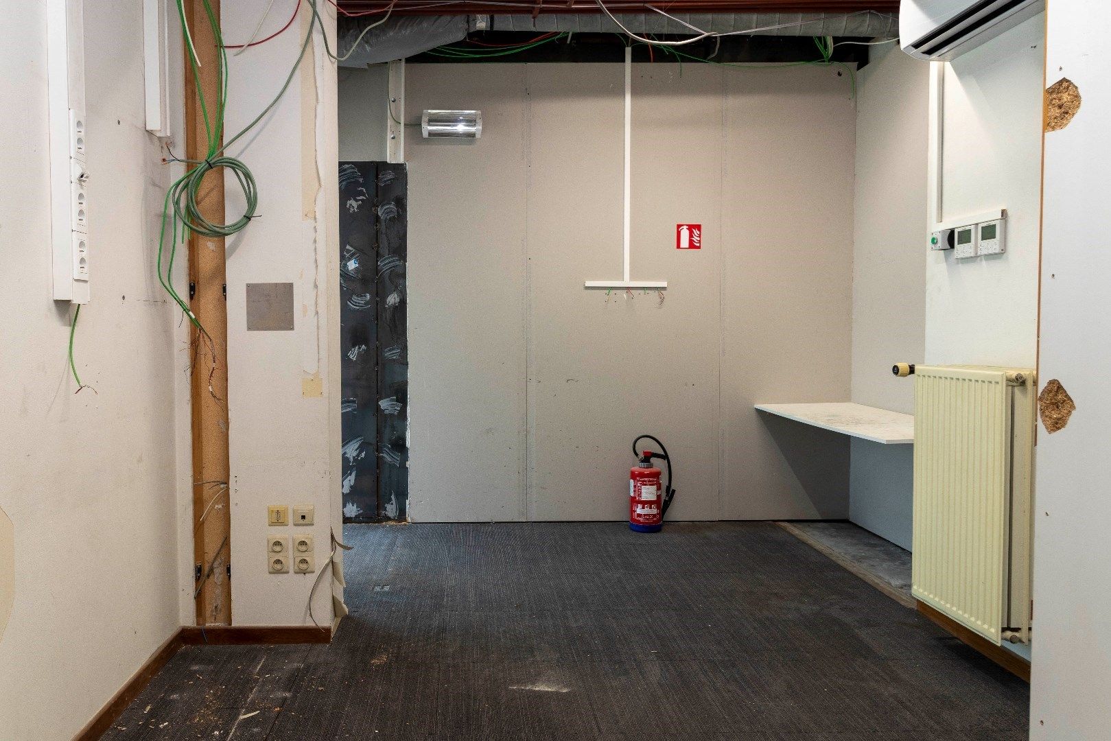 Ruim duplexappartement met gelijkvloerse handelsruimte foto 24