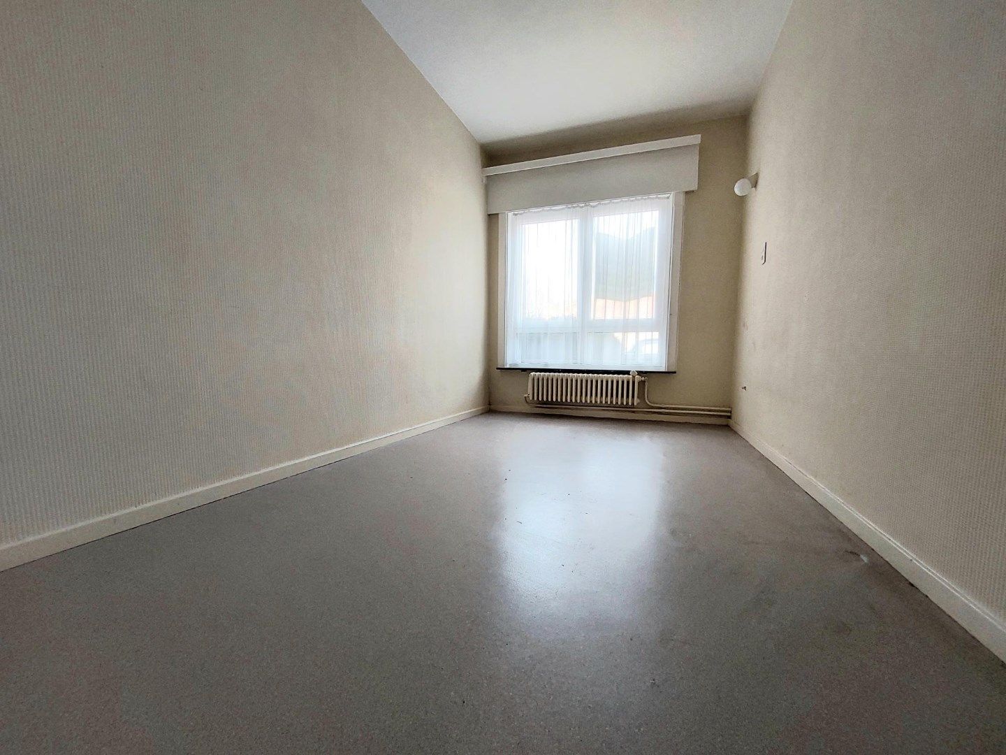 Gelijkvloersappartement met terras en garage foto 9