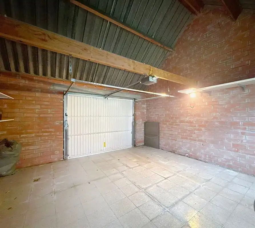 Ruime gezinswoning met grote garage en lange oprit in Dudzele foto 6