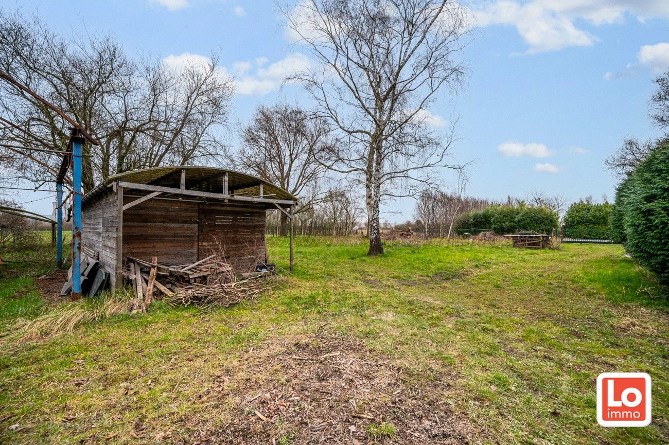 VERKOCHT!! Ruime alleenstaande volledig te renoveren woning met afzonderlijke garage op een makkelijk bereikbare locatie in Desteldonk. foto 4