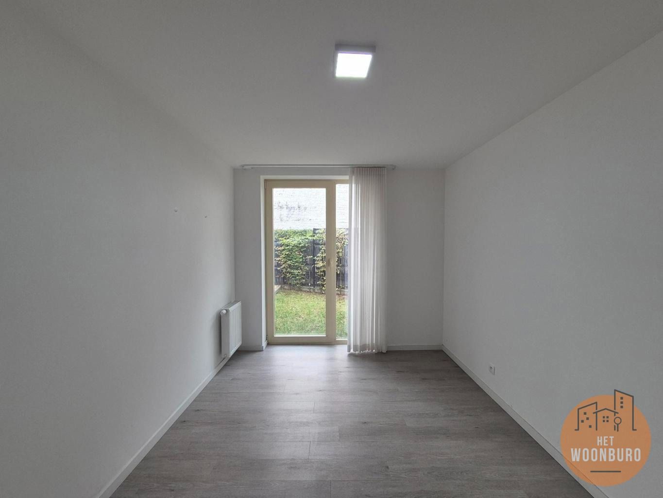 Gelijkvloersappartement met tuin, kelder en parkeerplaats foto 10