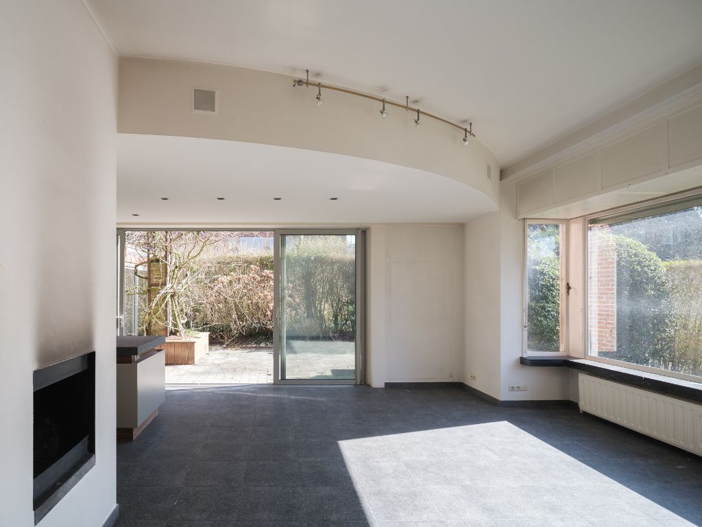 Voormalige dokterswoning met praktijkruimte en stadstuin foto 6