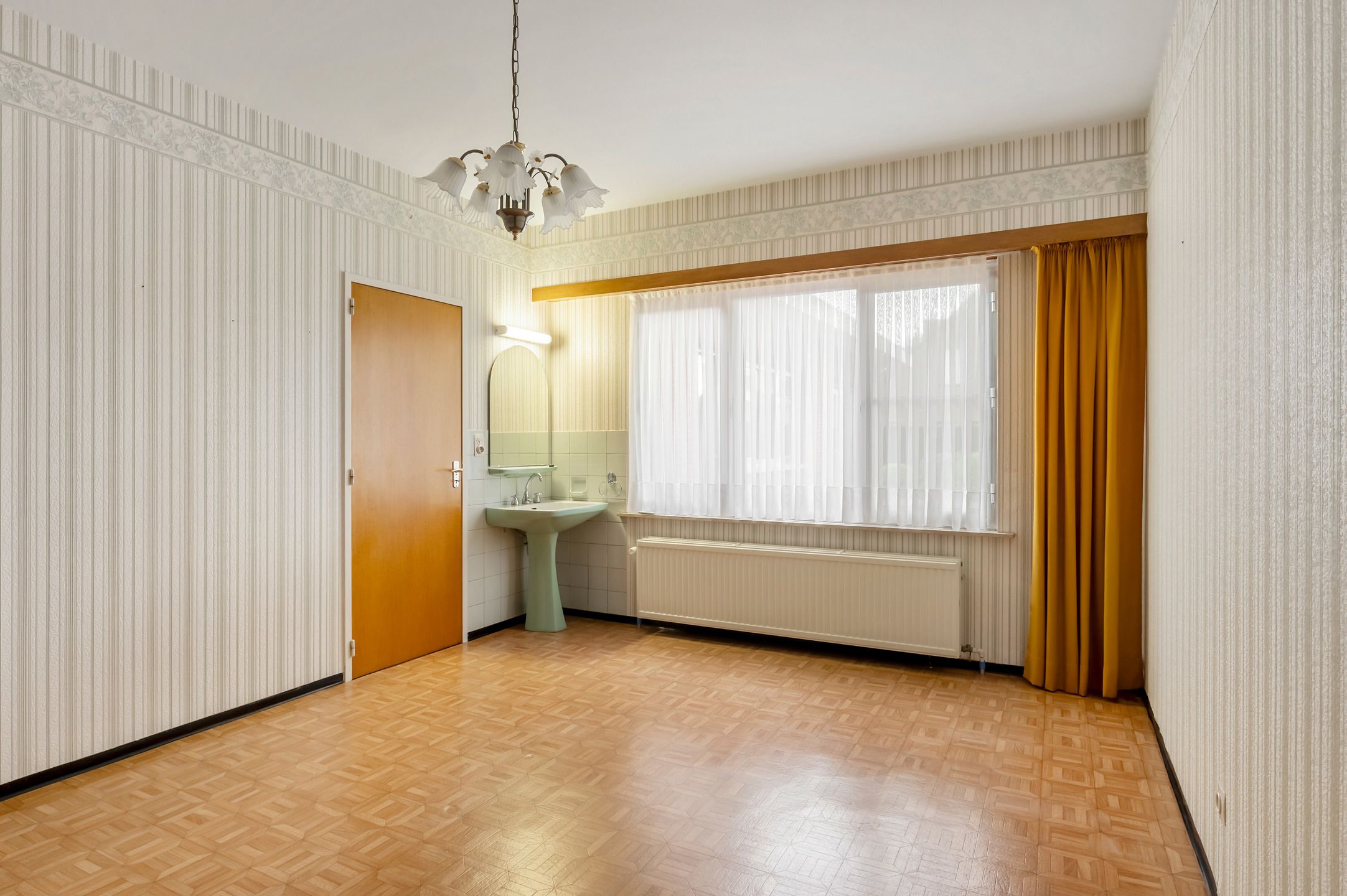 Goed onderhouden gelijkvloerse woning met 4 slaapkamers foto 13