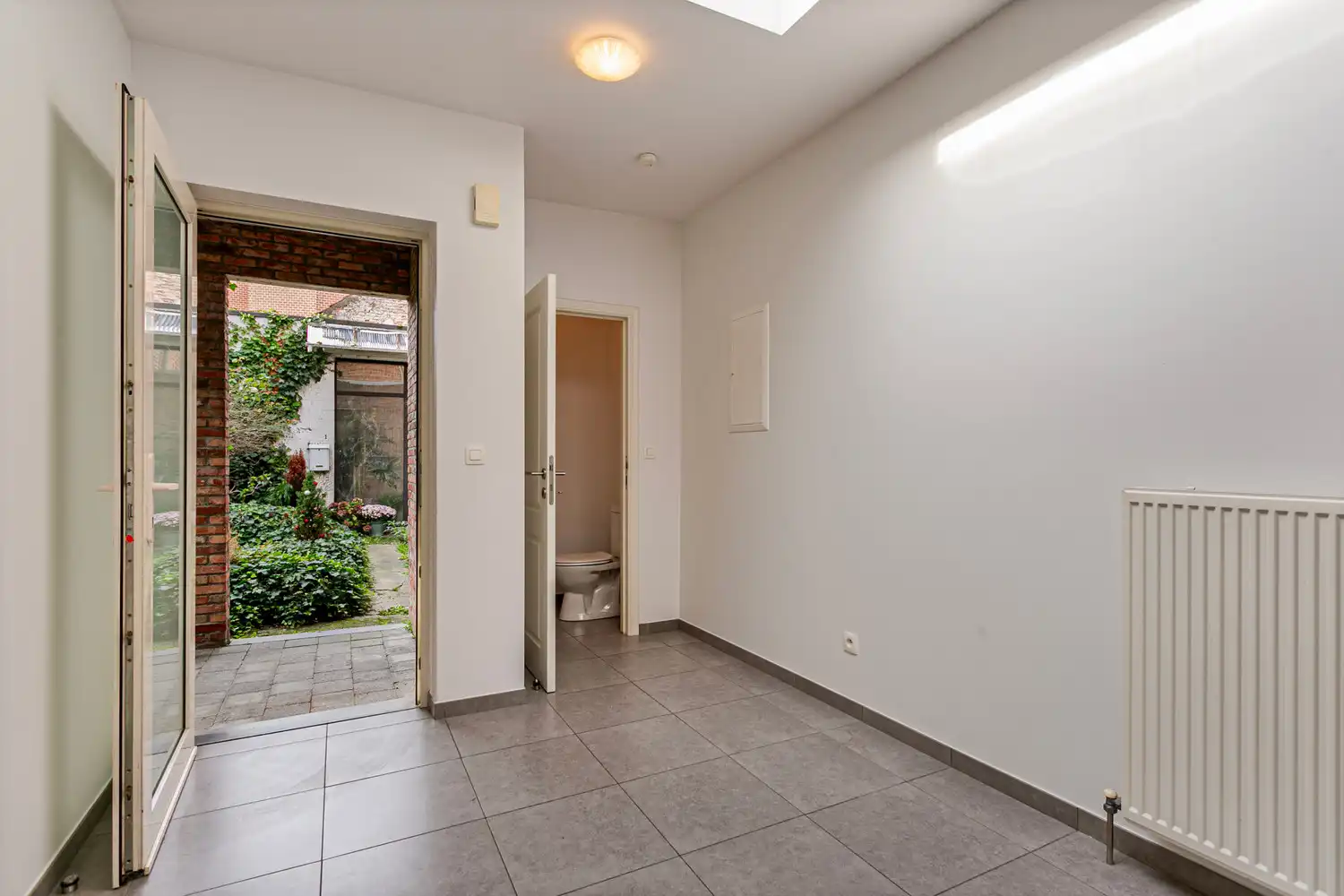 WONING MET ZEER GEZELLIGE TUIN TE LEUVEN! foto 6