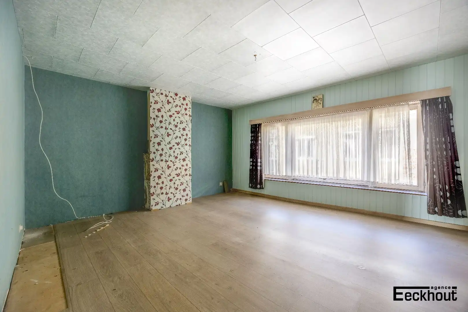 Te renoveren woning met diepe, zonnige tuin foto 10