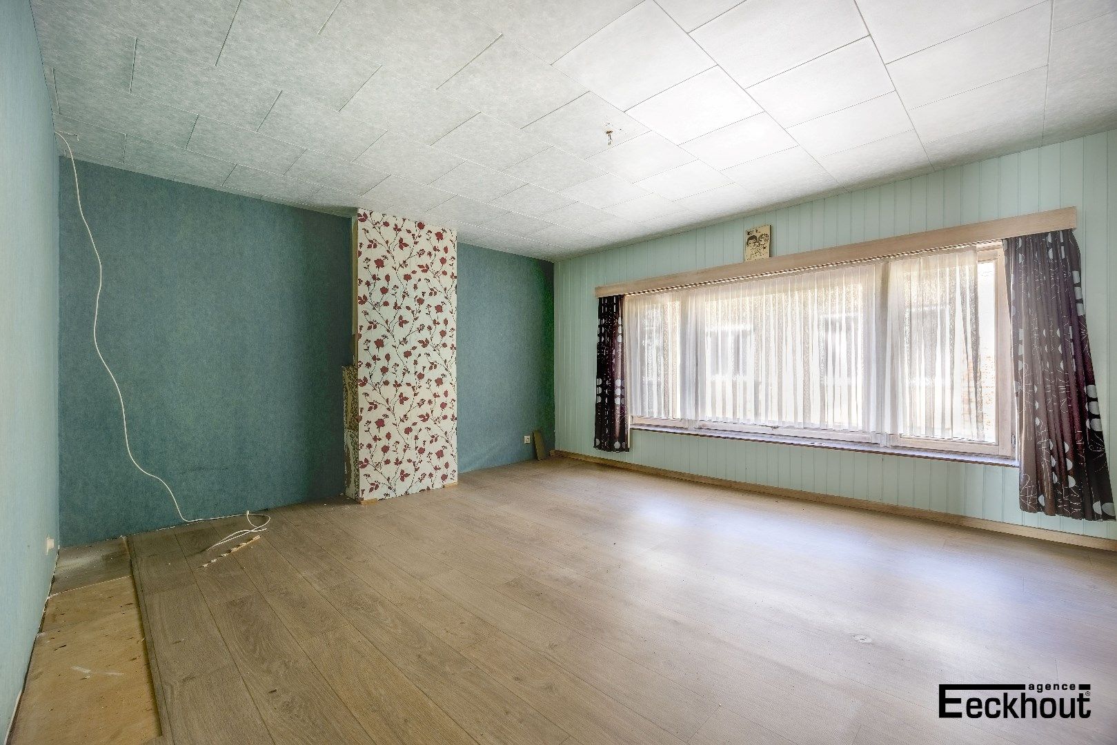 Te renoveren woning met diepe, zonnige tuin foto 7