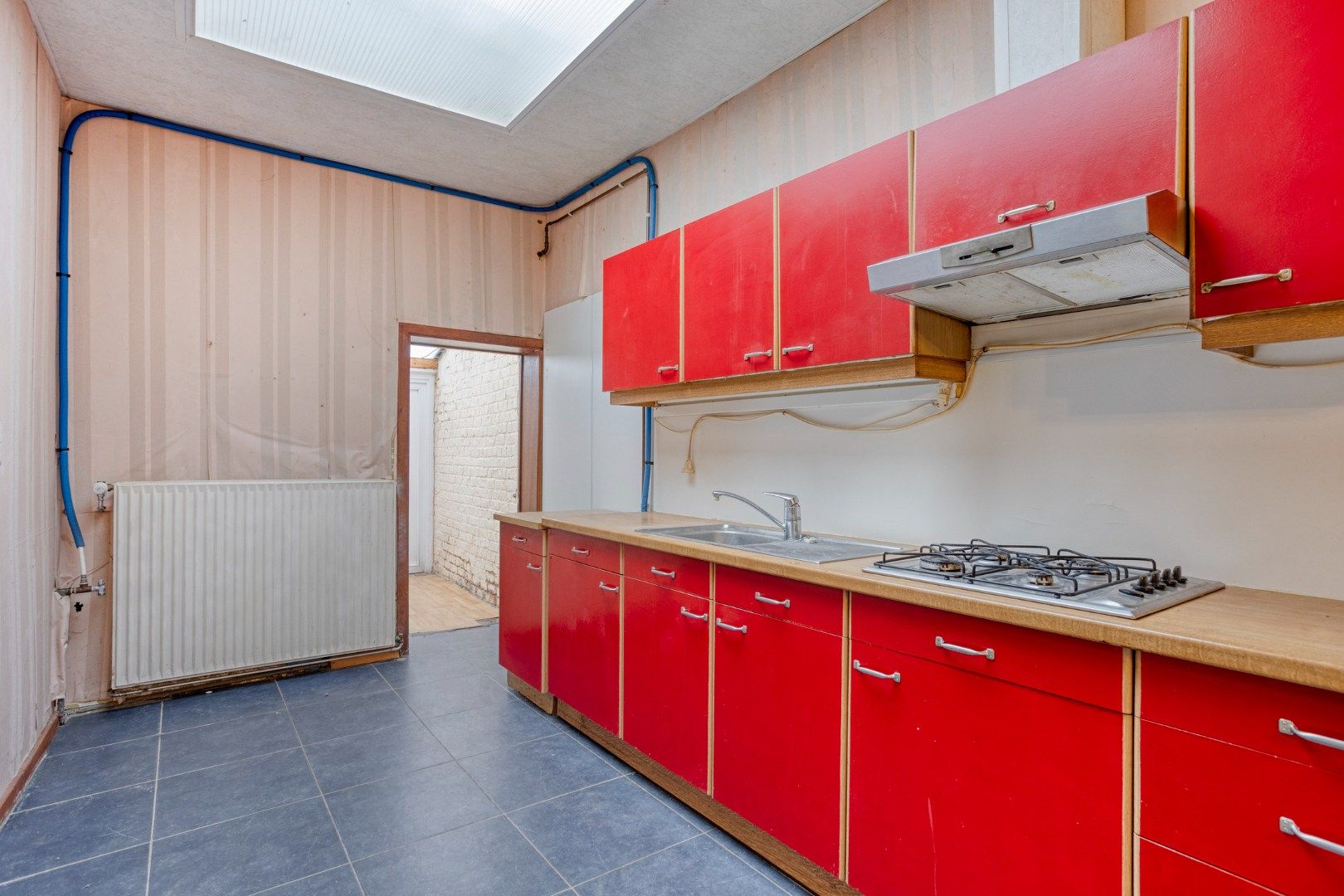 Goedgelegen rijwoning foto 5