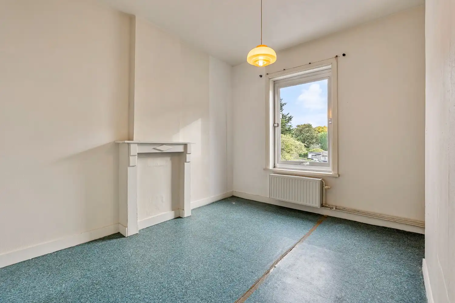 Goed gelegen rijwoning met 2 slaapkamers en een af te werken zolderruimte te Leuven! foto 14