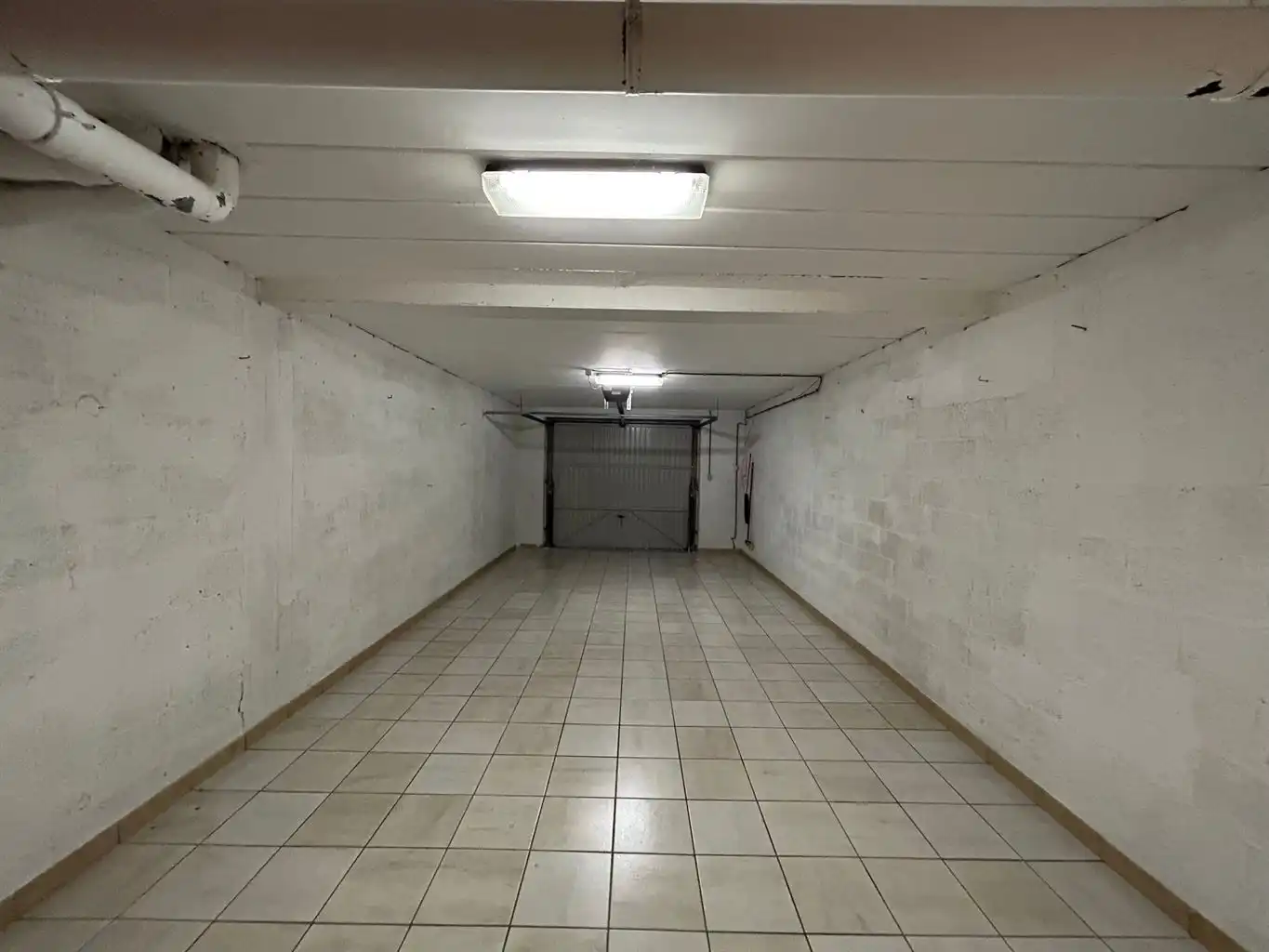 Ruim gelijkvloers appartement met 2 slaapkamers, terras, kelderberging en afgesloten garagebox. foto 15