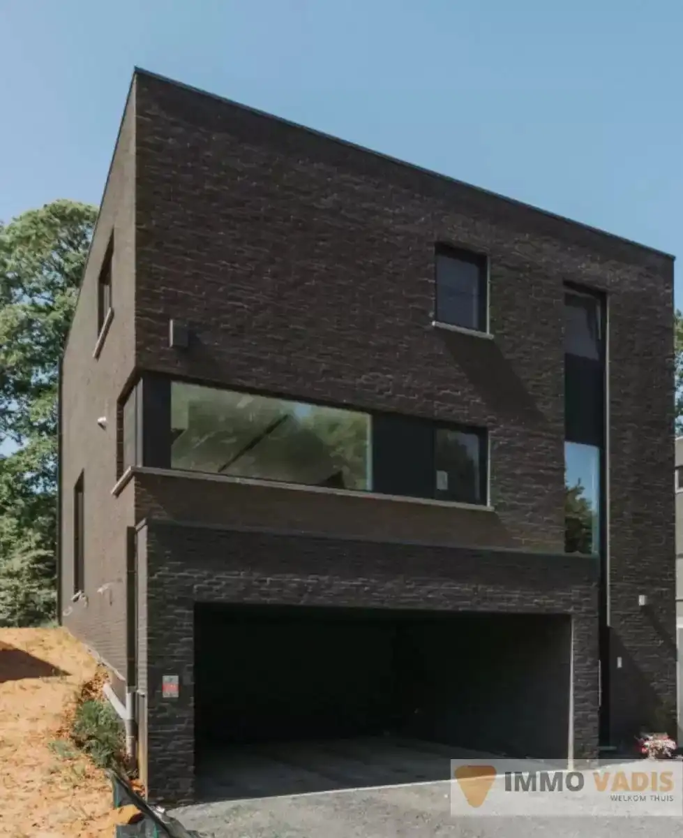 Grond met nieuwbouwwoning foto 2