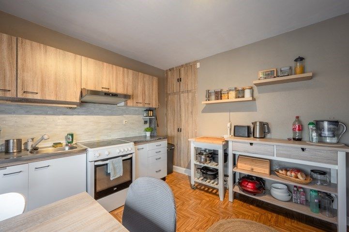 Opbrengsteigendom met 2 appartementen en garage/loods. foto 4