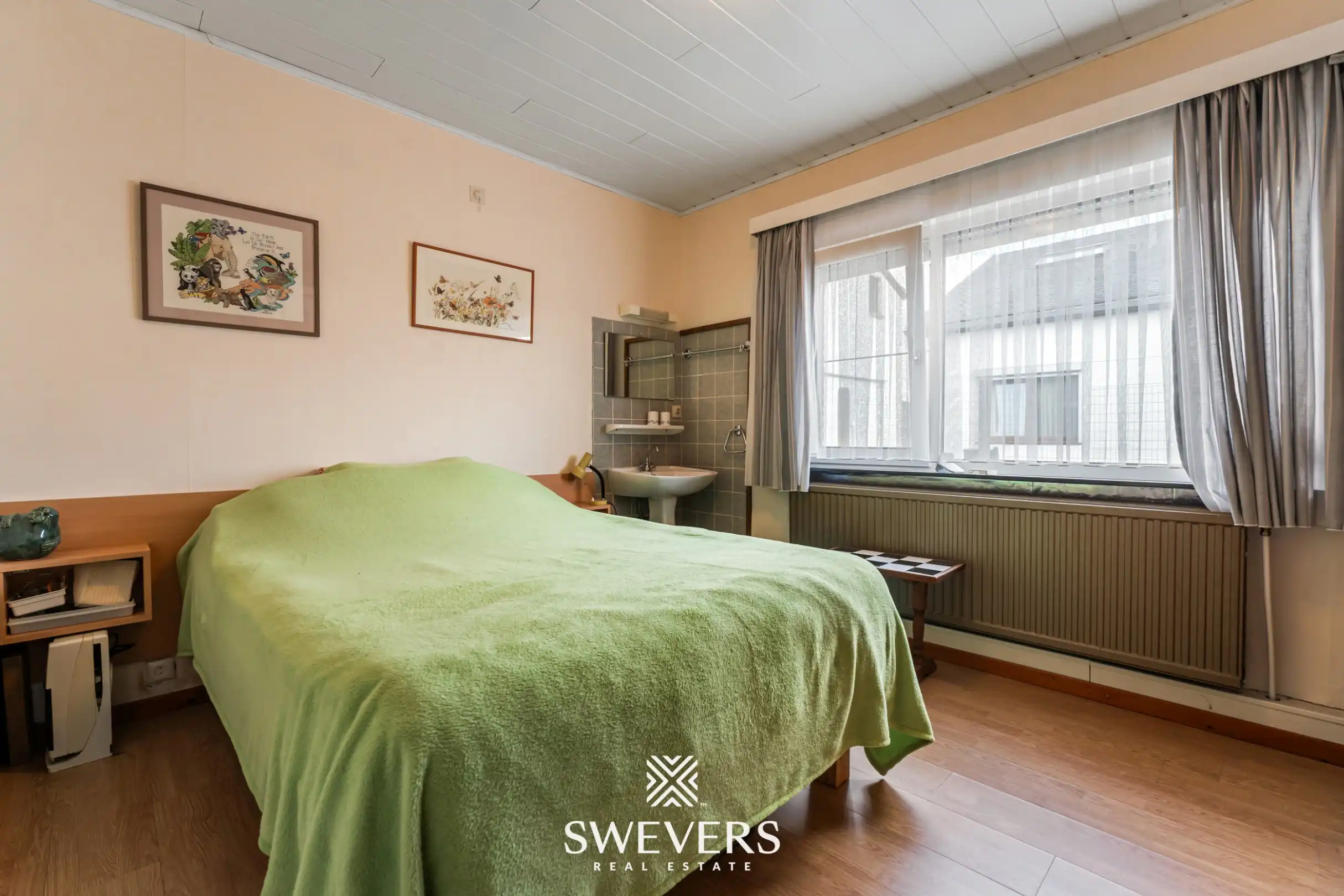 Instapklare gelijkvloerse woning met 4 slaapkamers op rustige en centrale ligging in Houthalen foto 11