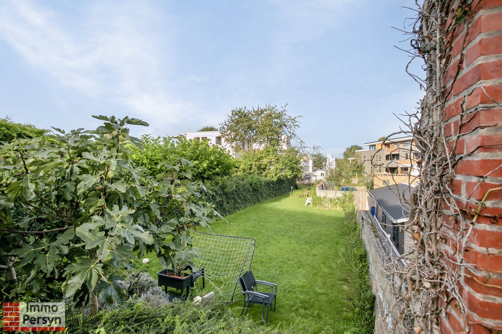 Gelijkvloers appartement met tuin, parkeerplaats en polyvalente ruimte foto 18