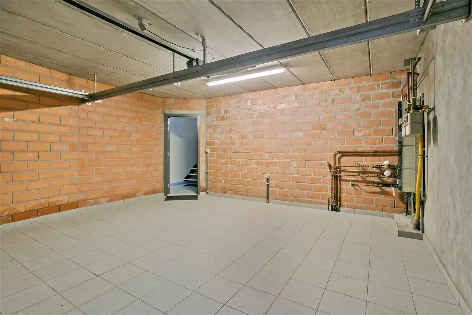 Gunstig gelegen duplex-appartement met inpandige garage en tuin foto 21