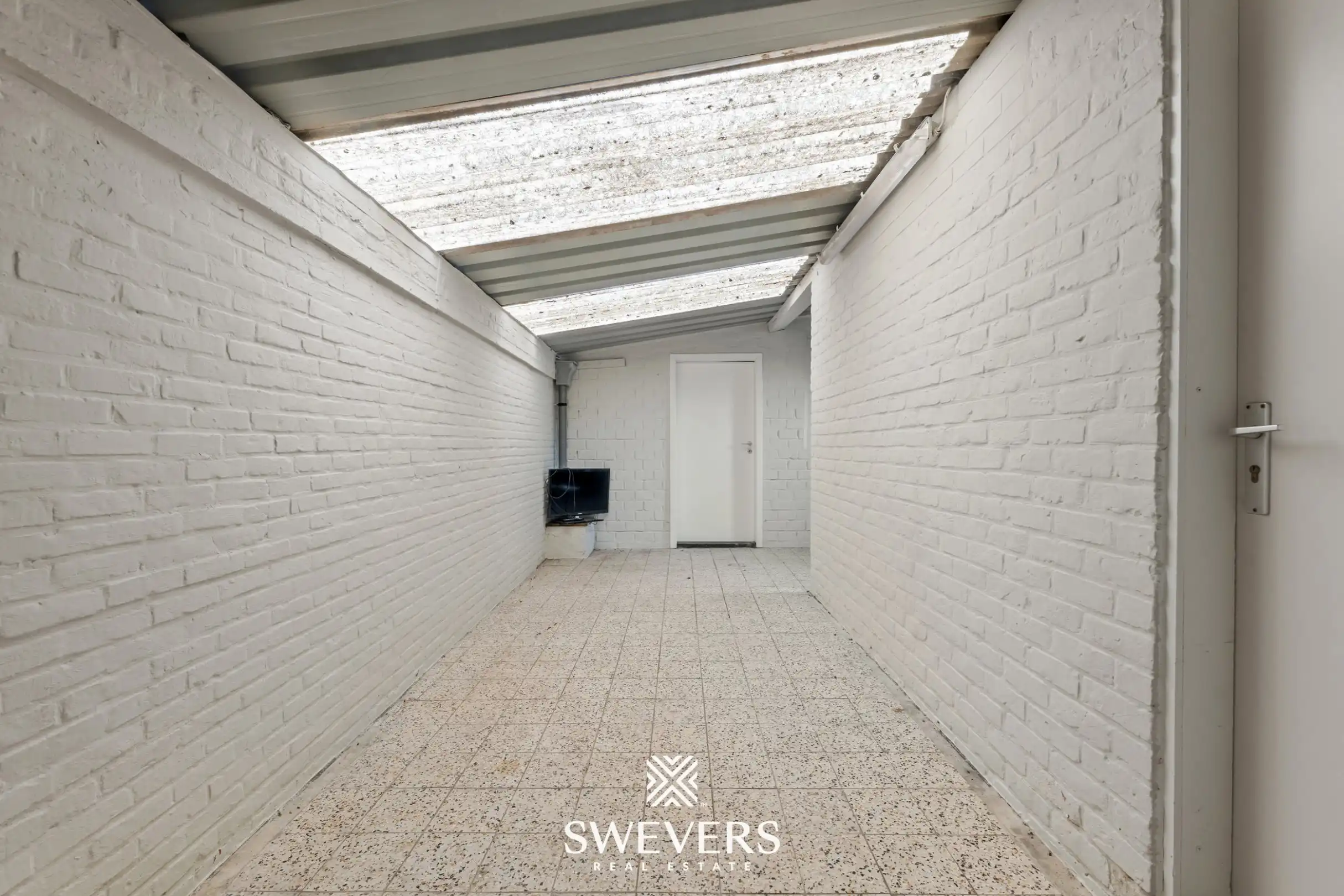 Te renoveren woning met 4 slaapkamers en 4 garages te Beringen foto 17