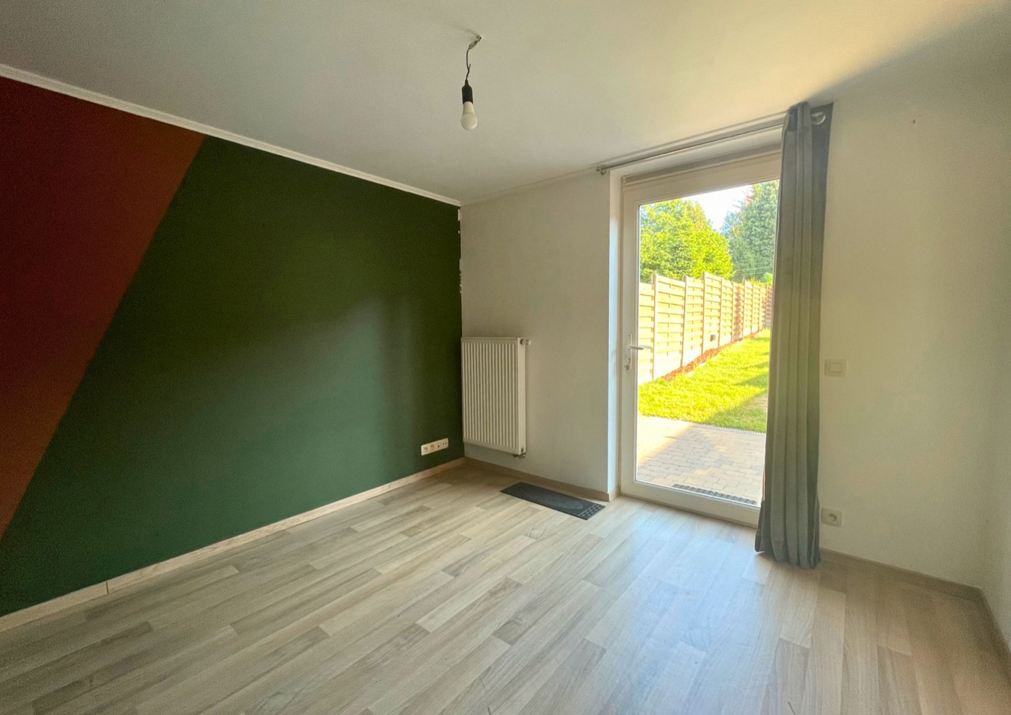 Ruim gelijkvloers appartement met tuin foto 7
