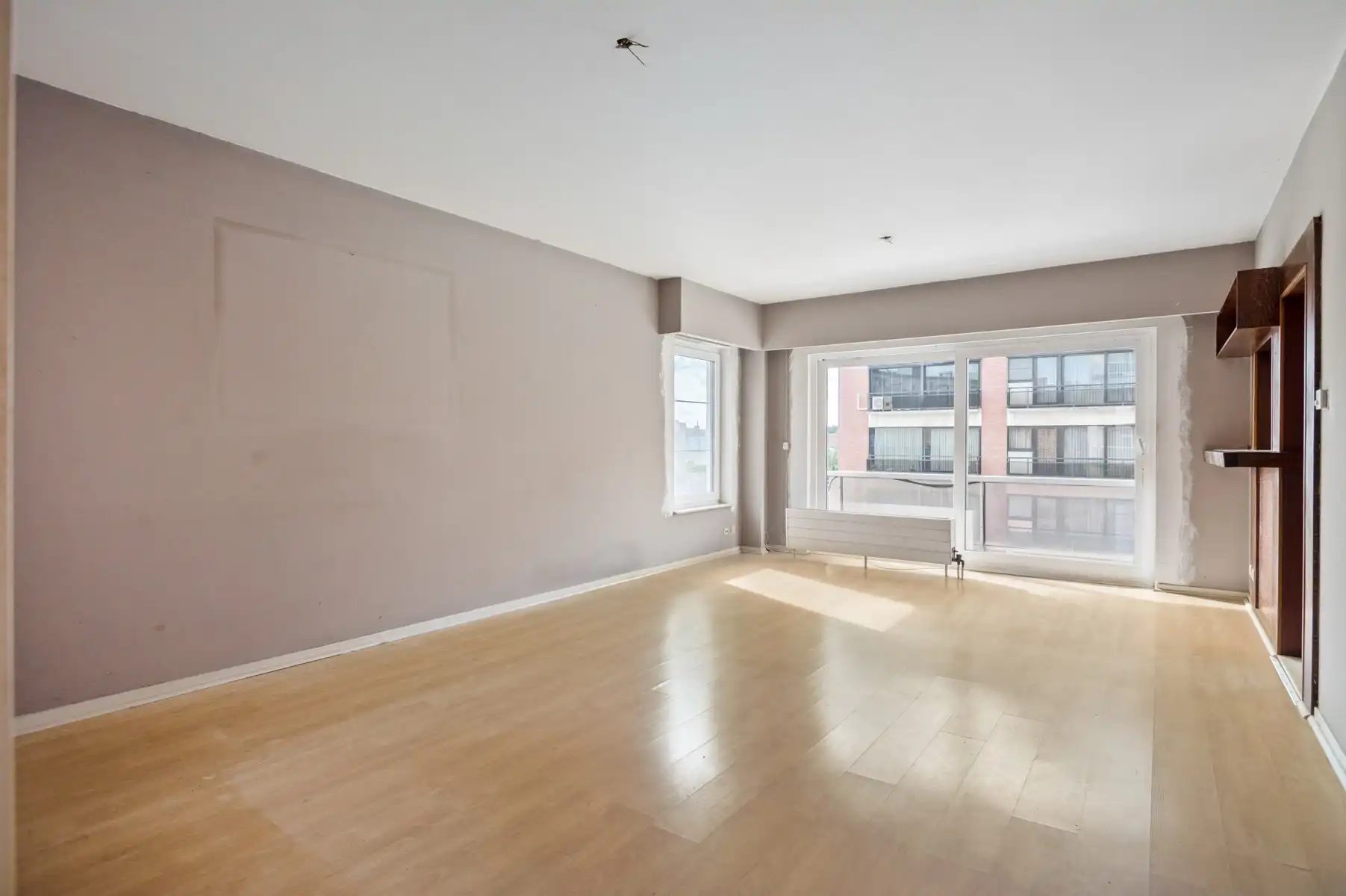 Goed gelegen 3-slaapkamerappartement met garage foto 2