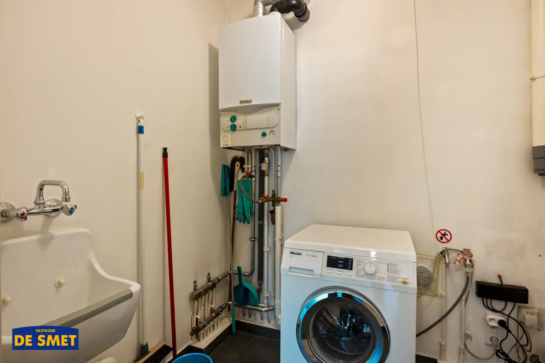 Gelijkvloers appartement met tuin, autostaanplaats én kelder foto 11