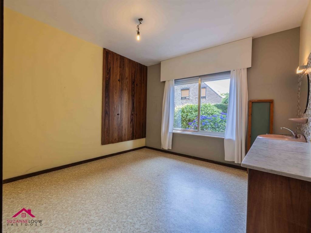 Vrijstaande, gelijkvloerse gezinswoning met inpandige garage foto 32