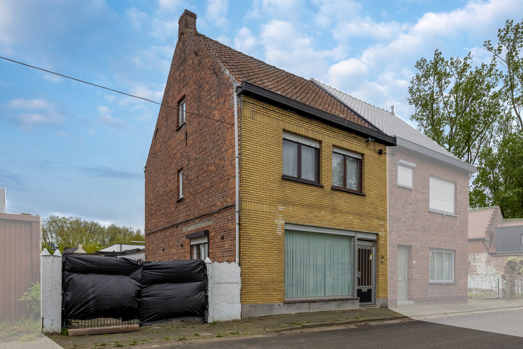 Hoofdfoto van de publicatie: Gezinswoning met veel potentieel, garage en tuin!